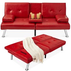 two red leather couches and a coffee table