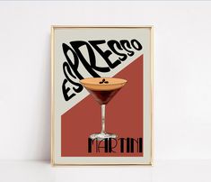 a poster with a martini in it on a white wall next to a black and red background