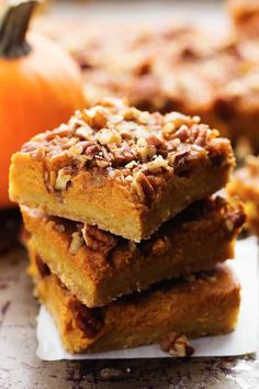 pumpkin pie bars stacked on top of each other