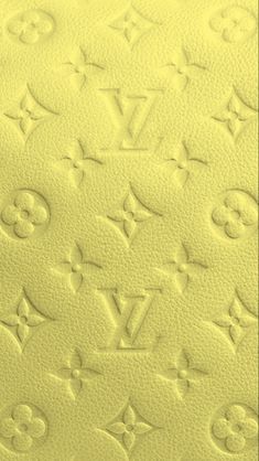 an image of a yellow background with louis vuitton written in white on it