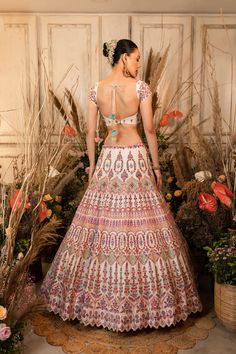 This playful lehenga is intricately embroidered with multi-hued resham threads, sequins, and glass beads and is paired with a matching blouse and mauve-pink organza dupatta.by Chamee and Palak. DELIVERY TIMEPlease allow 4-6 months for your outfit to arrive. FABRIC DETAILSRaw silk, Organza Floor-length Embellished Multicolor Sharara, Floor-length Multicolor Embellished Sharara, Multicolor Embellished Floor-length Sharara, Bohemian Pink Chanderi Dress, Pink Tissue Silk Choli With Mirror Work, Multicolor Embellished Anarkali Set With Traditional Drape, Embellished Multicolor Anarkali Set With Traditional Drape, Bollywood Style Embellished Multicolor Anarkali Set, Multicolor Embellished Semi-stitched Anarkali Set