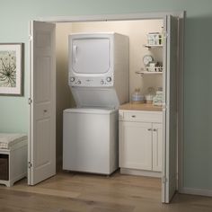 a washer and dryer in a small room