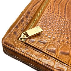 Embossed full-grain vegetable tanned premium leather RFID - protected 4.0"H x 8.0"W x 1.0"D 19 credit cards slots ID window 4 slip pockets in wallet Boarding pass compartment Bill zip compartment Back coin zip compartment Fabric lining Snap closure Gold-tone hardware Branded gift box Imported More real leather wallets >>> We also have a lot of ladies leather wallets. Luxury Rectangular Trifold Wallet For Daily Use, Luxury Business Trifold Wallet, Rectangular Cognac Wallet For Business, Luxury Trifold Wallet With Rfid Blocking For Daily Use, Cognac Rectangular Wallet For Business, Luxury Rectangular Trifold Wallet For Travel, Luxury Trifold Wallet With Leather Lining, Luxury Rectangular Trifold Wallet, Luxury Cognac Wallets For Travel