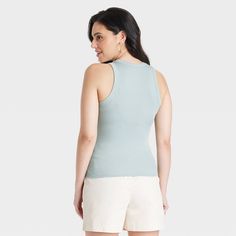 Dress up for casual outings in cool style with this Ribbed Tank Top from A New Day™. Framed by a crew neckline, the sleeveless tank top features a ribbed design and a flattering slim fit to create a sleek silhouette. Made from soft, stretchy fabric, this ribbed tank top offers comfortable all-day wear. Pair this top with jeans, shorts or trousers on warm days, or layer under jackets or cardigans for cozy styling when the weather turns cooler. A New Day™: Style that goes wherever you do. Tiny Tank, Top With Jeans, High Neck Tank Top, High Neck Tank, Ribbed Tank Top, Ribbed Tank Tops, Ribbed Tank, Workout Tank Tops, Womens Clothing Sizes