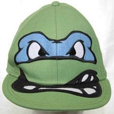 Leonardo TMNT Leo Teenage Mutant Ninja Turtles Hat Green Fitted Cap Size 7 3/8 Leonardo TMNT Leo Teenage Mutant Ninja Turtles Hat Green Fitted Cap Size 7 3/8 Leonardo TMNT Leo Teenage Mutant Ninja Turtles Hat Green Fitted Cap Size 7 3/8 Leonardo TMNT Leo Teenage Mutant Ninja Turtles Hat Green Fitted Cap Size 7 3/8 Leonardo Ninja Turtles Adult Baseball Hat Fitted Cap Size 7 3/8 - White/Black Fitted Cap Teenage Mutant Ninja Turtles Leo / Leonardo face Made in China SIZE: Fitted Size 7 3/8 COLOR: G Ninja Turtle Hat, Leonardo Ninja Turtle, Tmnt Leo, Leonardo Tmnt, Teenage Mutant Ninja Turtle, Fitted Caps, Mutant Ninja, Baseball Hat, Teenage Mutant Ninja Turtles