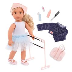 a doll is standing next to some accessories