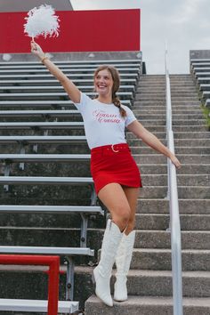 Details White baby tee Red lettering "Tailgate Cowgirl" on front Materials and Care 100% Cotton Wash cold Dry low heat Cheerleader Skirt, White Baby Tee, Cowgirl Baby, Poses Photography, Model Poses Photography, Denim Outerwear, Skirt Belt, Denim Details, Romper Pants