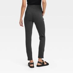 Add comfort and chic style to your pared-back outfits with these High-Rise Ponte Leggings with Pockets and Side Zipper Split Hem from A New Day™. These high-rise ponte leggings in heathered black are easy to pair with a range of tops for versatile styling options. Made from super stretchy fabric in a slim-leg regular fit, the pants offer all-day comfy wear. The full elastic waistband offers you an easy pull-on fit, and the split hem, side zipper and slash pockets add functional details. A New Da Casual Stretch Pants With Zipper Closure, Casual High-waisted Leggings For Loungewear, Stretch Leggings With Zipper Closure For Work, Stretch Leggings With Zipper For Work, Chic High-waisted Leggings For Loungewear, Relaxed Fit Leggings With Pockets, Ankle-length Loungewear Leggings, Casual Fall Leggings With Zipper Closure, Non-stretch Ankle-length Leggings For Loungewear