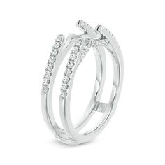 two white gold rings with diamonds on them