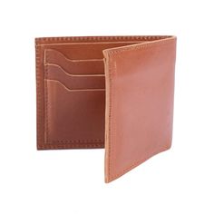 Our Ado billfold wallet is crafted with the highest quality leather and features 6 credit card slots to hold all your important cards as well as a billfold compartment to store your cash. Featuring a classic, timeless design this wallet makes the perfect gift. Features 4.5" length x 3.75" width x 0.75" height x 9" open 6 credit card slots High quality leather from environmentally conscious and sustainable sources. Lifetime guarantee Brown Bifold Wallet With Rfid Blocking, Classic Bifold Wallet With Coin Pocket, Classic Rectangular Wallet With Interior Card Slots, Classic Rectangular Wallets With Interior Card Slots, Classic Trifold Card Holder With Id Window, Classic Bifold Card Holder For Everyday Use, Classic Formal Trifold Wallet With Card Slots, Classic Brown Wallet For Everyday Use, Classic Wallets With Card Slots For Daily Use