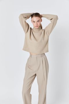 Our Pleated Wide Trousers are the perfect addition to your wardrobe. The pleated design adds a touch of sophistication, while the wide legs offer a flattering silhouette. Equipped with pockets for practicality, these trousers also feature a zipper with hook and bar closure for a secure fit. Whether worn for work or a night out, these pants are sure to make a statement. Made from high-quality materials, they are comfortable and durable. Don't miss out on these versatile and stylish trousers that Knitwear Trends, Knit Loungewear, Chic Sweater, Strapless Bodycon Dress, Wide Trousers, Denim Sweater, Chic Sweaters, Outerwear Outfit, Blazer And Shorts