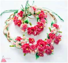 three bracelets with flowers and leaves on top of each other, one is made out of rope