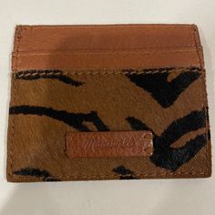 4x31/4” Approximately With Several Pockets On Each Side And In The Middle. Nwot And Great Condition. Pebbled Leather And Calfhair In A Classic Zebra Print. Super Cute And Functional! Casual Brown Rectangular Card Holder, Casual Brown Card Holder With Rfid Blocking, Casual Brown Card Holder, Madewell Sunglasses, Madewell Accessories, Cape Scarf, Silk Noil, Silk Bandana, Trouser Socks