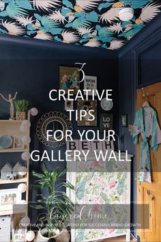 a room with blue walls and wallpaper that says creative tips for your gallery wall