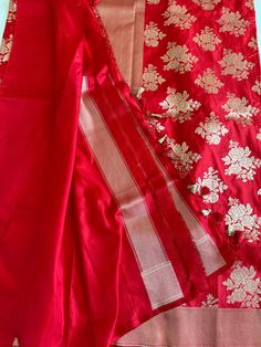 **SILK MARK CERTIFIED** **Gorgeous pure Banarasi Katan Silk Saree with blouse piece (unstitched) in red and gold** **100% silk and high quality** **Direct from Banaras** Material: 100% Katan Silk Blouse piece: Included (Unstitched) Fall and Pico: YES Color: Green, Gold Occasion: Festivals, Weddings, Cultural Events, Puja, Parties, Formal Gatherings, Family Functions, Graduations Experience the charm of this Handwoven Green Banarasi Meenakari Katan Silk Saree, a beautiful blend of art and traditi Festive Red Cotton Silk Traditional Wear, Red Cotton Silk Kurta For Wedding, Wedding Red Cotton Silk Kurta, Red Cotton Silk Traditional Wear With Traditional Drape, Red Slub Silk Sets For Festivals, Red Cotton Silk Dupatta With Zari Work, Wedding Cotton Silk Red Dupatta, Red Cotton Silk Dupatta For Wedding, Wedding Red Cotton Silk Dupatta