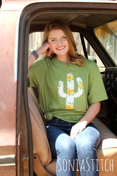 "An unbelievably soft shirt with a cactus raggy applique. Beside the applique is the word \"grow\" embroidered in a delicate vintage script font. This applique features a floral fabric cactus. - Sizes available are Small through 3X. I find that these shirt fits true to size. Order your regular size unless you are wanting an oversized fit. - The shirts are a blended fabric and wash & dry up beautifully without shrinking. ---Ordering information--- Select your size from the drop down. The fabr Cactus Tshirt Inspire Uplift ⭐, Green Pre-shrunk Tops For Spring, Cute Green Relaxed Fit Top, Spring Casual Soft-washed Shirt, Casual Soft-washed Spring Shirt, Vintage Script Font, Fabric Cactus, Vintage Script Fonts, Cactus Tshirt