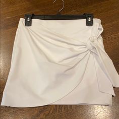 White Forever 21 Skirt Size: Medium Never Worn White Asymmetrical Chic Skort, Chic White Asymmetrical Skort, White Asymmetrical Skort For Day Out, White Asymmetrical Lined Skort, Chic Mini Skirt By Forever 21, Chic Mini Skirt From Forever 21, White Lined Skort For Night Out, White Flared Skirt For Night Out, Chic Mini Length Skort By Forever 21