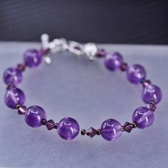 "6.5\", vintage sterling silver 925 handmade bracelet with amethyst beads, stamped 925" Handmade Purple Sterling Silver Beaded Bracelets, Purple Bracelet With Polished Beads, Handmade Adjustable Amethyst Sterling Silver Bracelet, Purple Polished Bead Bracelet Jewelry, Purple Polished Bead Bracelet, Purple Sterling Silver Beaded Bracelets With Round Beads, Silver Amethyst Bracelets With Round Beads, Silver Amethyst Beaded Bracelets, Adjustable Purple Sterling Silver Crystal Bracelet