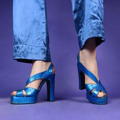 "Ultra rare & collectible vintage 1970s platform heels by the late, great Terry De Havilland. Electric blue metallic snakeskin cut in a sunray front, swirly block heel & double stacked platform. I love the sculptural way the ankle strap wraps around the foot.  Terry was a pioneer and an artist- he made fantastical shoes for the stars of the 70s and beyond. These platform heels are so beautifully made and are the perfect party piece. Would best fit UK 4.5 / EU / US Women's  Inner sole:23cm Width of sole:7cm Heel:5\" platform:1\" *size is an approximation. They are marked a UK 3.5, though I find 70s TDHs come up bigger than their label. Please refer to measurements and don't hesitate to message with any questions (instagram:70sstacks)" Terry De Havilland Shoes, Terry De Havilland, Platform Shoes Heels, Pink Two Piece, Funky Shoes, Snakeskin Heels, Womens Pumps, Heels Platform, Ankle Strap Pumps