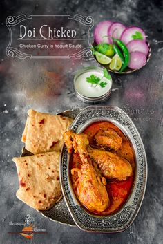 chicken curry in yogurt sauce served with pita bread