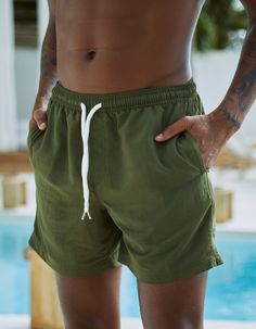 Rsq Nylon Shorts. Elastic Drawstring Waist. Welt Hand Pockets. Back Right Patch Pocket. Approximate Inseam: 6". Approximate Outseam: 17". 100% Recycled Nylon. Machine Wash. Imported. | Rsq 6" Nylon Shorts Nylon Bottoms With Built-in Shorts For Beach Season, Casual Swimwear With Elastic Waistband, Green Sporty Swim Trunks With Drawstring, Nylon Stretch Swim Trunks With Drawstring, Stretch Nylon Swim Trunks With Drawstring, Solid Nylon Swim Trunks With Drawstring, Casual Solid Swim Trunks With Elastic Waistband, Solid Drawstring Shorts For Beach Season, Green Drawstring Short Swim Trunks