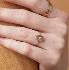 Modern, yet classic, the Dainty Oval Ring is a compliment-worthy add to your everyday jewelry collection. 11x17mm oval tag, starburst imprint 18 ga Gold-filled Hide Pillows, Living Room Accent Tables, Gift Of Time, Oval Ring, Sneaker Slippers, Oval Rings, Socks And Sandals, Everyday Jewelry, Ring Necklace