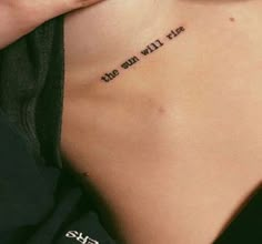 a woman with a tattoo on her back saying,'i will not die '