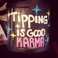 a black trash can with the words tipping is good karma painted on it