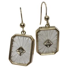 Art Deco Style 14k Yellow Gold Camphor Glass Diamond Earrings Weighting 5.1 Gram 14K gold Dimensions 17mm by 13 mm Hangs about one inch Two single cut diamonds weighting .03 Carat in total Art Deco 14k Gold Earrings, 14k Gold Art Deco Earrings, Art Deco Yellow Gold Dangle Jewelry, Gold Art Deco Clip-on Earrings For Formal Occasions, Vintage Brilliant-cut Diamond Earrings, Gold Art Deco Earrings, Art Deco Inspiration, Jewelry Chest, Estilo Art Deco