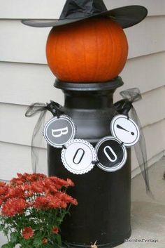 a halloween decoration with a pumpkin on top