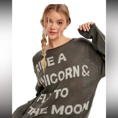 Get Ready To Ride In Style With Our Listicle Ride A Unicorn Sweater In Charcoal. Made With Love And Magical Powers, This Sweater Will Make You Believe In Magic And Keep You Cozy On Your Adventures. Perfect For Any Unicorn Lover, This Sweater Is Sure To Bring A Touch Of Whimsy To Your Wardrobe .Lightweight Sweater With Round Neckline. Super Comfy With Detailed Edging. One Size Gray Sweater For Fall, Gray Letter Print Sweater For Fall, Gray Casual Top, One Size Fits All, Trendy Gray Sweater With Letter Print, Fly To The Moon, Unicorn Sweater, Light Knit Sweater, Preppy Sweater, Thermal Sweater