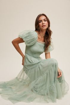 Beautiful tulle mint green dress with smocked bodice, with fun puff sleeves, ruffle detailing, elastic waistband and square neckline. Self and Lining 100% Polyester Hand wash in cold water. Aprox. measurements in inches: S:Length of self-46, length of lining-42 |Bust-28 |Waist-26 M:Length of self-47, length of lining-42.5 |Bust-30 |Waist-28 L:Length of self-47, length of lining-43 |Bust-32 |Waist-29 modest dresses, modest dress, modest midi, modest maxi, modest fashion, modest trendy dresses, mo Semi Modest Dresses, Moss Colored Dress, Modest Tulle Dress, Modest Graduation Dresses, Easter Prom Dress, Bridesmaid Dresses Sleeves, Modest Graduation Dress, Modest Dress Patterns, Seafoam Green Dress