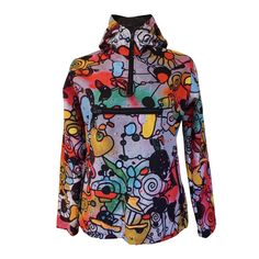 a women's jacket with colorful designs on it