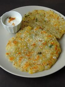 two flat breads on a white plate with sauce