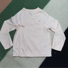 New Without Tags Ralph Lauren Baby Pink Layette Top With Button And Tie Closure. 100% Cotton #B10 Fitted Long Sleeve Tops For Playwear, Cute Ralph Lauren Long Sleeve Top, Pink Ralph Lauren Cotton Tops, Fitted Cute Ralph Lauren Tops, Cute Fitted Ralph Lauren Tops, Pink Long Sleeve Ralph Lauren Tops, Ralph Lauren Pink Long Sleeve Tops, Pink Long Sleeve Tops For Playtime, Ralph Lauren Long Sleeve Tops For Spring