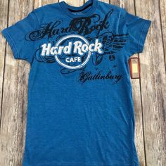 Nwt Hard Rock Cafe T-Shirt. It Came From The Hrc In Gatlinburg, Tn. Hard Rock Cafe Sweater, Vintage Hard Rock Cafe Sweatshirt, Rock Style Cotton T-shirt With Logo Print, Rock And Roll Cotton T-shirt With Short Sleeves, Casual Fan Merchandise Shirt For Music Festivals, Casual Logo Print T-shirt For Music Festivals, Casual T-shirt With Logo For Music Festivals, Casual Short Sleeve Shirt With Band Logo, Rock And Roll Short Sleeve Tops With Graphic Print