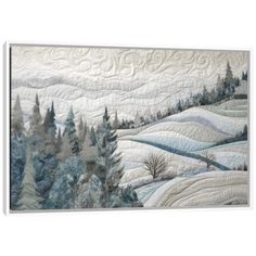 a quilted wall hanging with trees and hills in the background on a white wall