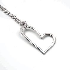 silver open heart pendant Simple Silver Heart Pendant Necklace, Meaningful Heart-shaped Sterling Silver Necklace, Simple Silver Heart Necklace For Gift, Silver Simple Heart Necklace For Gift, Simple Silver Heart Necklace As Gift, Simple Silver Heart Necklace Gift, Simple Silver Heart Necklace For Anniversary, Everyday Silver Charm Necklace With Heart Pendant, Silver Heart Pendant Charm Necklace For Everyday