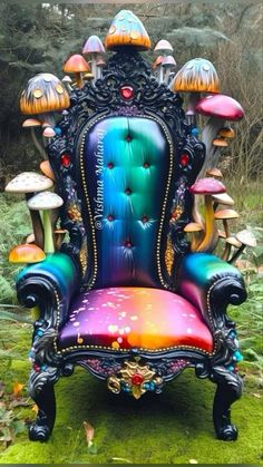 a colorful chair sitting in the grass with mushrooms on it