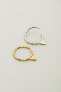 Unique small triangle septum ring. This unique septum ring is hand made, and available in sterling silver / gold plated silver / 14k yellow gold / 14k white gold. Gauge: 18 (1 mm) Diameter: 8 mm This popular triangle septum is bold and beautiful, and it's inspired by the Indian nose rings and tribal shapes in a minimalist style. Can be also worn as a regular hoop earring, helix piercing or tragus. Fits men and women styles. ----------------------------------------------------- > Triangle sept Adjustable Minimalist Metal Septum Ring, Unique Septum, Septum Gold, Unique Nose Rings, Gold Gauges, Septum Piercing Jewelry, Small Silver Hoop Earrings, Gold Nose Hoop, Indian Nose Ring