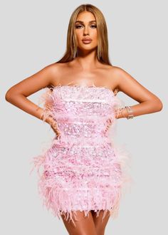 A special occasion calls for a special look. This Strapless Feathers & Sequins Mini Party Dress is the perfect choice for a fashionable night out. Crafted in pink and featuring an intricate blend of feathers and sequins, this dress sparkles with style. Occasion: Party/Club/Evening/Cocktail/Wedding Material: Polyester, Spandex Fit Type: Slim Fit Elasticity: Slight Stretch Dresses Length: Above Knee, Mini Decoration: Feathers Closure Type: zipper Pink Strapless Prom Evening Dress, Pink Strapless Evening Dress For Prom Season, Pink Fitted Mini Dress For Prom, Flirty Mini Dress For Wedding Party Season, Pink Fitted Strapless Evening Dress, Pink Mini Length Evening Dress, Fitted Strapless Pink Evening Dress, Pink Strapless Gala Evening Dress, Pink Strapless Evening Dress For Party