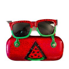 Sunglasses Matching Case Trendy Red Sunglasses As Gift, Red Tinted Sunglasses As A Gift, Casual Multicolor Glass Sunglasses, Red Tinted Lenses Sunglasses As Gift, Retro Sunglasses With Tinted Lenses For Gift, Retro Sunglasses With Tinted Lenses As Gift, Retro Sunglasses With Tinted Lenses As A Gift, Playful Green Sunglasses For Beach, Fun Sunglasses With Uv Protection For Gift