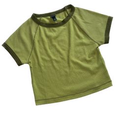 Brand: Wild Fable Size: Xs Color: Green New With Tags Length: 16” Approximately Pit To Pit: 13” Approximately Green Ribbed Crew Neck T-shirt, Basic Ribbed Cropped T-shirt For Summer, Casual Ribbed Cropped Cotton T-shirt, Trendy Green Ribbed T-shirt, Green Stretch Cotton Cropped T-shirt, Casual Ribbed T-shirt For Spring, Sporty Ribbed Crew Neck Tops, Sporty Ribbed Top With Relaxed Fit, Sporty Ribbed Relaxed Fit Tops