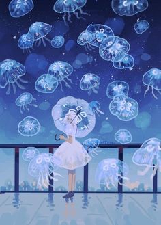 a woman holding an umbrella standing in front of jellyfish