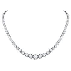 This finely made graduated necklace with beautiful round diamonds sits elegantly on any neck. Metal: 14k Gold Diamond Cut: Round Total Diamond Approx. Carats: 10ct Diamond Clarity: VS Diamond Color: F-G Size: 16 inches Color: White Gold Included with your order: Certificate of Appraisal Customized Necklace Box & Bag Customized Necklace, Diamond Tennis Necklace, Vvs Diamond, Graduation Necklace, Vs Diamond, Tennis Necklace, Necklace Box, Station Necklace, American Diamond