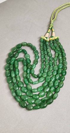 "Green Aventurine Smooth Plain Oval Shape Beads Green Aventurine Smooth Tassel Necklace Color : Green Stone : Green Aventurine Size : 6.5X10-11x15 Mm Length :17-20\"Inches Code : NMML269 Weight : 730 Carat Delivery time frames (from date of shipping) - USA: ~2 weeks - Rest of the World: ~ 3-4 weeks For Express Shipping https://www.etsy.com/listing/656108132/express-shipping-5-to-7-business-days?ga_search_query=express&ref=shop_items_search_1&frs=1&crt=1 EXPRESS SHIPPING CHARGES IS -- Oval Emerald Bead Necklace For Jewelry Making, Emerald Necklace With Oval Gemstone Beads For Jewelry Making, Spiritual Oval Beaded Necklace With Gemstone Beads, Emerald Necklace With Round Aventurine Gemstone Beads, Green Oval Gemstone Beaded Necklaces, Oval Green Gemstone Beaded Necklaces, Emerald Necklace With Aventurine Gemstone Beads, Green Oval Gemstone Beaded Necklace, Green Oval Gemstone Bead Necklace