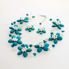 "Material: Howlite Turquoise ,Fwpearl Bead size: 4mm-6mm-8mm-10mm,15*15mm,15*20mm,20*30mm Necklace size: 18\" + 2\" extension chain Color:As show Packing: Beautiful Pouch All items in my shop are made to order. Most of the time it takes 1-3 business days but can be longer at times and for larger orders. If you want to order of different style. Please contact me . ----------------------------------------------------- Please feel free to convo me should you have any question! Thank you! :)" Turquoise Flower-shaped Jewelry For Wedding, Turquoise Flower Jewelry For Wedding, Turquoise Flower-shaped Wedding Jewelry, Handmade Turquoise Flower-shaped Jewelry, Turquoise Flower-shaped Jewelry With Matching Earrings, Boyfriend Girlfriend Necklaces, Pearl Flower Earrings, Birthstone Necklace Mothers, Promise Necklace