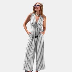 Get ready to make a statement in our Striped Tassel Wide Leg Jumpsuit! Featuring vibrant stripes and playful tassel details, this jumpsuit effortlessly combines style and fun for any summer adventure. This jumpsuit can be dressed up with heeled sandals and statement jewelry for a night out or paired with flat sandals and a denim jacket for a casual daytime look. Its versatility and unique design make it a standout piece in any summer wardrobe. Product code: CAA13E4E015BC Mini Jumpsuit, Maxi Jumpsuit, Linen Women, Wide Leg Jumpsuit, Heeled Sandals, Summer Wardrobe, Flat Sandals, Statement Jewelry, Sleeve Styles