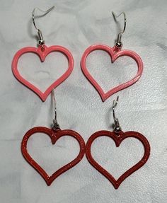 Our 3D printed earrings offer a modern twist on classic style. These lightweight accessories are designed to last, made from high-quality materials and production processes that guarantee durability and long-lasting wearability. Pen Ideas, Printed Earrings, 3d Printed Earrings, Raffle Prizes, 3d Printed Jewelry, 3d Pen, Vendor Events, 3d Printed, Candy Cane