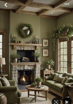 a living room filled with furniture and a fire place in the middle of a room